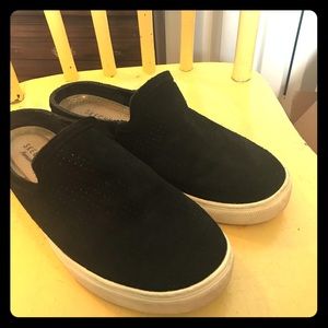 Slip on black and white sneakers